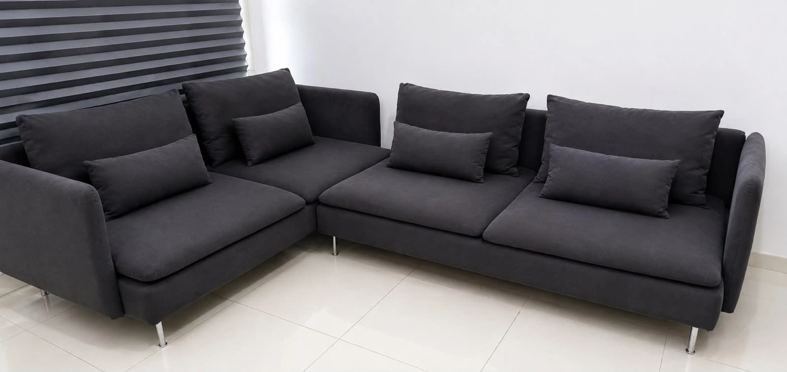 Cheap used sofas on display at a used furniture shop in Mussafah M37, Abu Dhabi